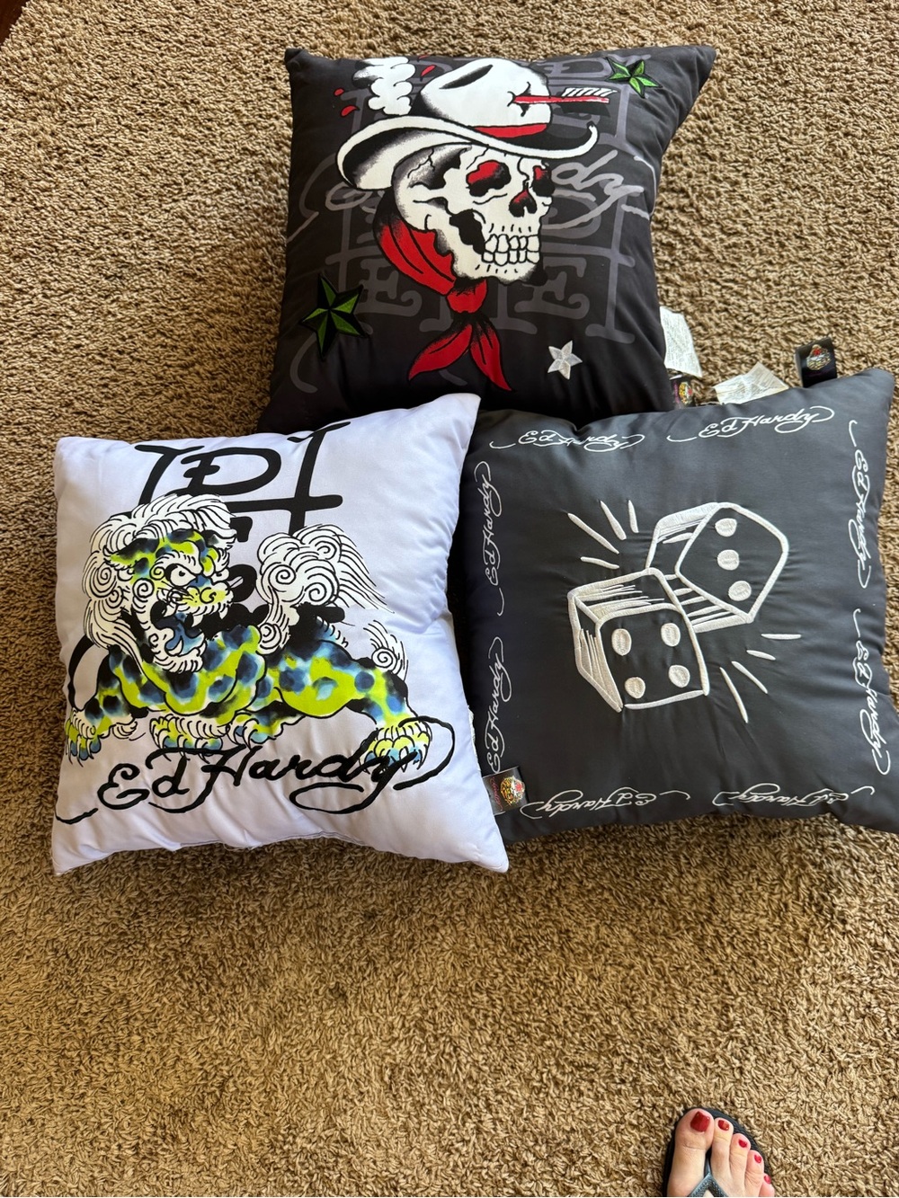 Trio  3 of Ed Hardy throw pillows. 16-17”